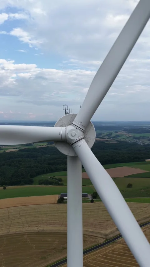 Vertical Aerial View of Wind Turbine Generating Clean Energy Germany Stock Footage 325502539