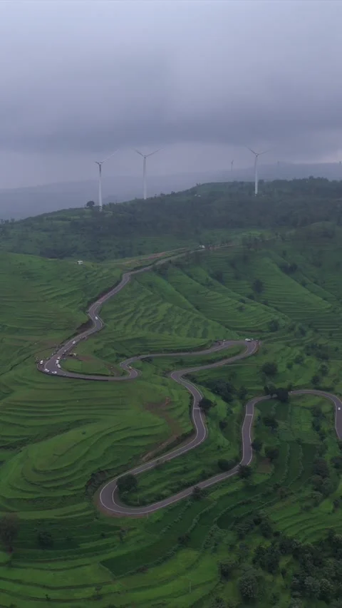 Vertical Aerial View of Winding Mountain Road on Gudhe Panchgani Plateau Sangli Stock Footage 346270933