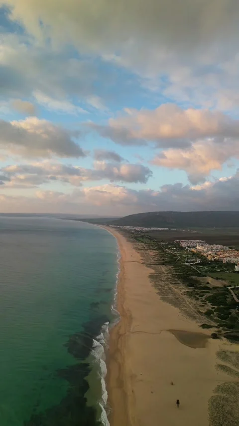Vertical aerial view of Zahara de los Atunes beach and Atlanterra resort wi.. Stock Footage 293064151