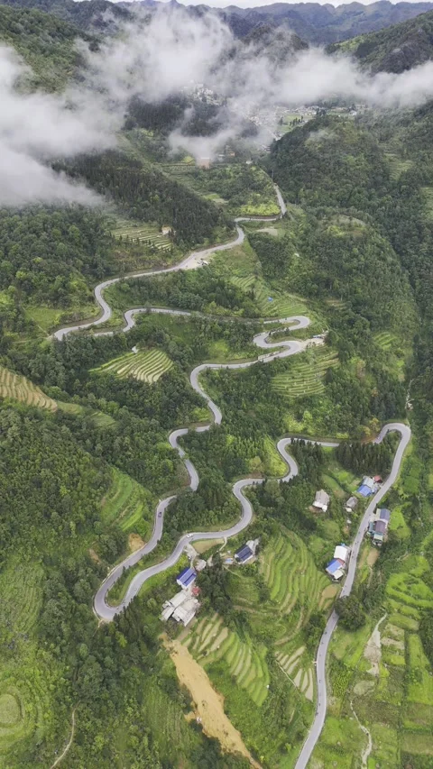Vertical aerial view of zigzag roads along Ha Giang Loop, Vietnam – 4K Stock-Footage 325040505