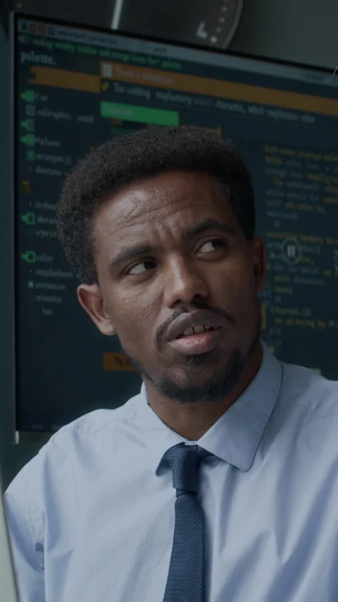 Vertical of African American Programming Teacher Speaking during Lesson Stock Footage 284922306