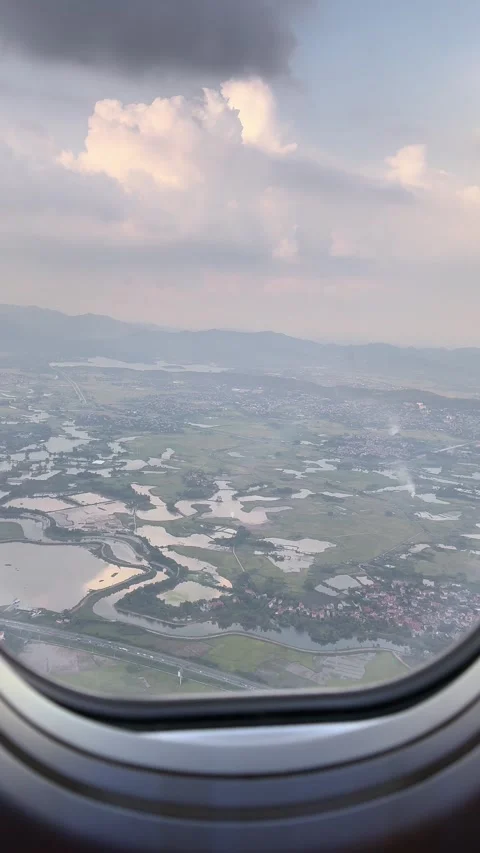(Vertical) Airplane Window View of Flooded Rice Fields Near Hanoi Video stock 342590753