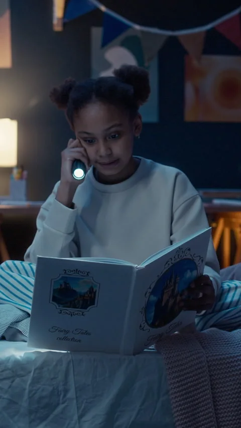 Vertical of Alien Monster Sneaking Up Behind Little Girl Absorbed In Reading Stock Footage 310929654