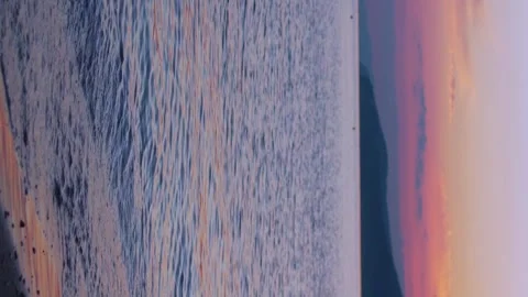 Vertical, Amazing Sunset on the Seashore Time Lapse. Colorful Purple Blue Yellow Stock Footage 305642181