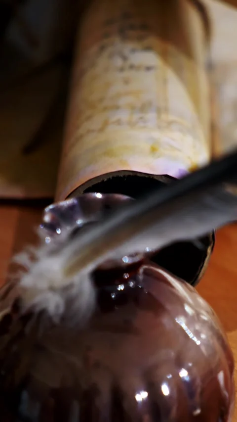 Vertical. Ancient parchment, bound by time. Aged scrolls and candles. Stock Footage 305160573