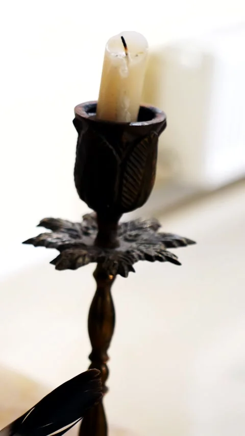 Vertical. Ancient parchment, bound by time. Aged scrolls and candles. Stock Footage 305160894