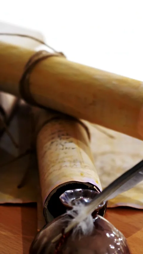 Vertical. Ancient parchment, bound by time. Aged scrolls and candles. Stock Footage 305160907
