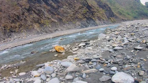 Vertical and horizontal over look to river water surged rapidly with speed raced Stock Footage 266501772