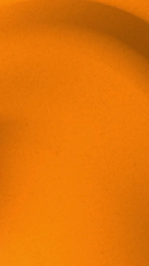 Vertical animated background showcases smooth gradients of warm orange tones Stock Footage 290170486