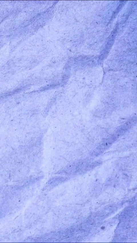 Vertical Animation Of Crumpled Vivid Blue Paper Texture Animation Loop Stock Footage 340501732