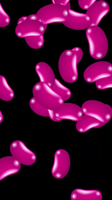 Vertical Animation of Pink Jelly Bean Candies Falling on Black Background Stock Footage 346274131