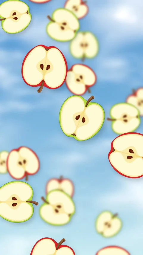 Vertical Animation of Red and Green Apple Halves Falling Through Blue Sky Stock Footage 342923733