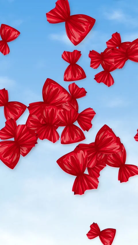 Vertical Animation of Red Wrapped Candies Falling Through a Blue Sky Stock Footage 344231186
