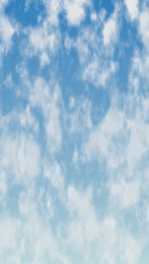 Vertical Animation of White Clouds Drifting Across a Blue Sky Stock Footage 341067418