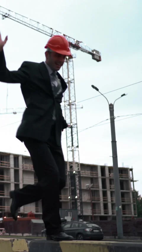 Vertical of Architect funny ape when walk by beam Stock Footage 305454245