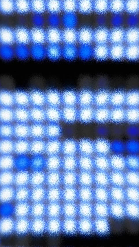 Vertical array of luminous blue and white lights Stockbeeldmateriaal 332245440