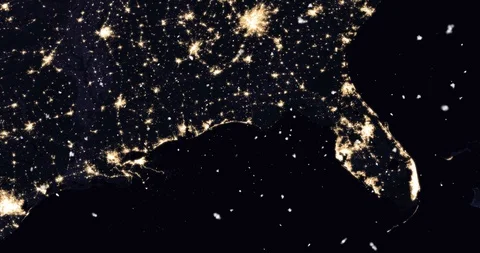 Vertical ascent through light falling snow, over the US Gulf Coast, at night. Видео 99431952