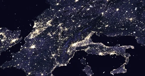 Vertical ascent through light falling snow, over central Europe, at night. Stock Footage 99432197