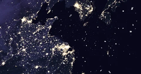 Vertical ascent through light falling snow, over China, Korea, Japan, at night. Видео 99432345