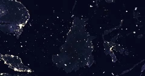 Vertical ascent through light falling snow, over Southeast Asia, at night. Vidéo 99432485