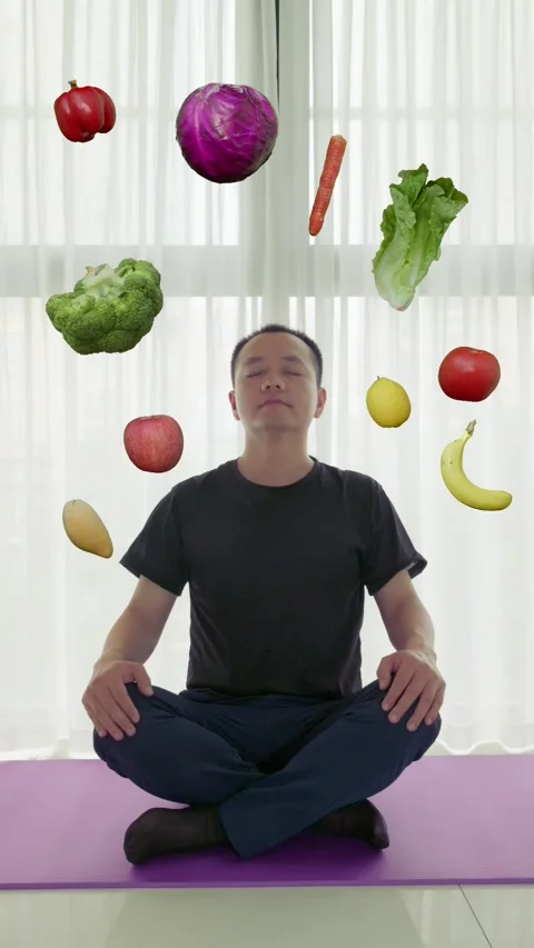 Vertical Asian man practices yoga and meditates at home to calm his mind Stock-Footage 335368785