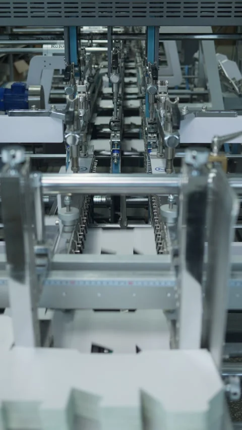 Vertical of Automatic Folder Gluer Machine in Factory Production Line Stock Footage 335482528