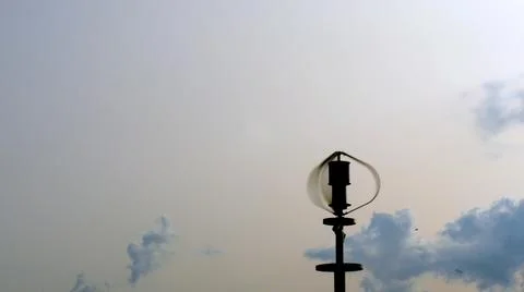 Vertical axis wind turbine utilize renewable wind energy while spinning Stock Photos