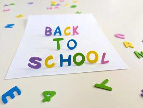 Vertical back to school concept featuring colorful three dimensional foam let Stock Photos