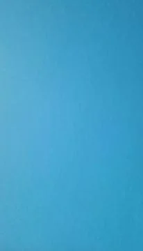 Vertical background in clear blue sky color Stock Photos