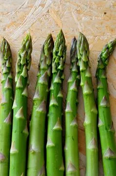 Vertical background with fresh asparagus Stock Photos