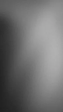 Vertical background gradient with black gray and white shades grainy and bl.. Stock Photos