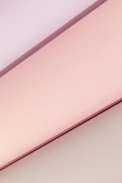 Vertical Background with Layered Diagonal Shapes in Pink and Beige Tones Stock Photos