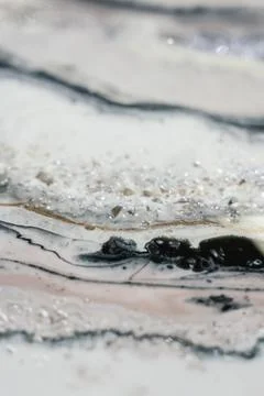 Vertical background modern abstract design made with epoxy resin. splashes of Stock Photos