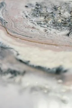 Vertical background modern abstract design made with epoxy resin. splashes of  스톡 사진