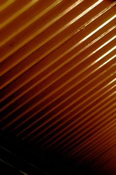 A vertical background or wallpaper of rectangular shapes with sunlight and sh Foto stock