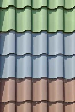 Vertical background of roofing in the form of tiles in different colors Stock Photos