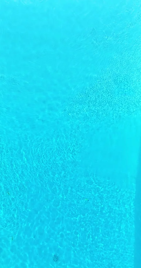 A vertical background of turquoise, fresh, shining swimming pool water 스톡 동영상 278030683