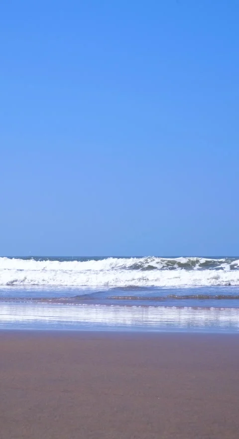 Vertical Background Waves on the sandy beach Stock Footage 121529447