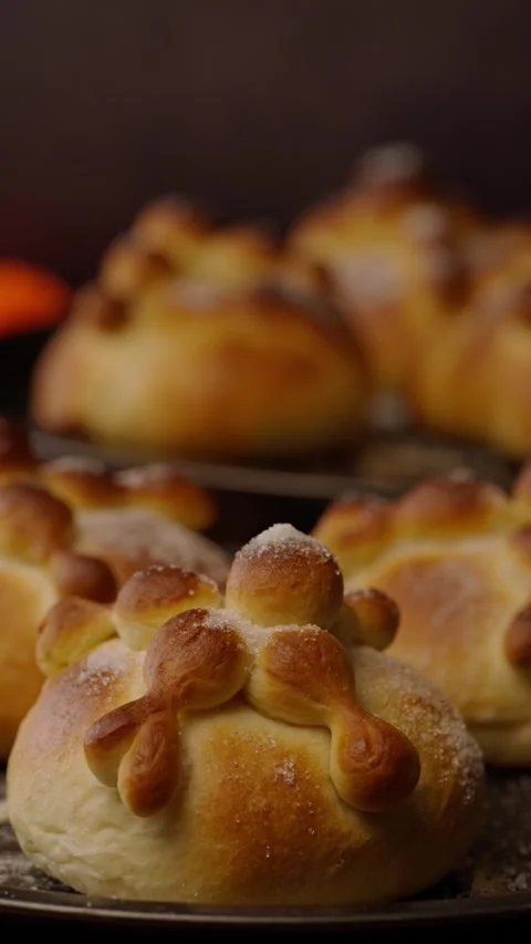 Vertical bakery video, homemade pan de muerto for the religious holiday Stock Footage 282499322