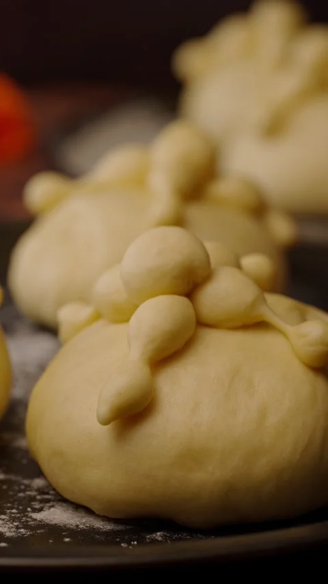 Vertical bakery video, raw bread of the dead Stock Footage 282499320