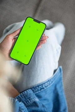 Vertical banner with modern technologies concept. Woman using mobile with green Stock Photos