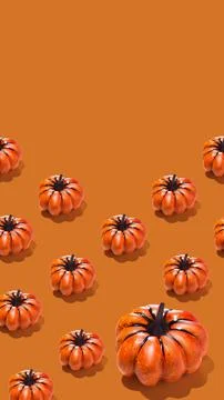Vertical banner with orange pumpkin pattern on orange background. Minimal autumn 스톡 사진