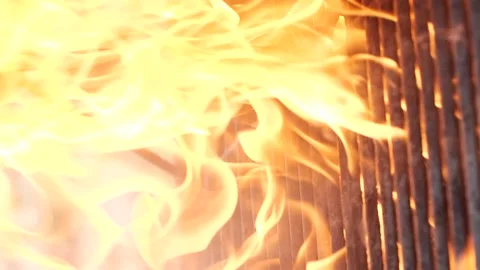 Vertical barbecue grill, slow motion bbq fire flame burning, cooking outdoors Stockbeeldmateriaal 201910150