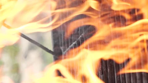 Vertical barbecue grill, slow motion bbq burning fire flame, closeup fireplace Stock Footage 259137913