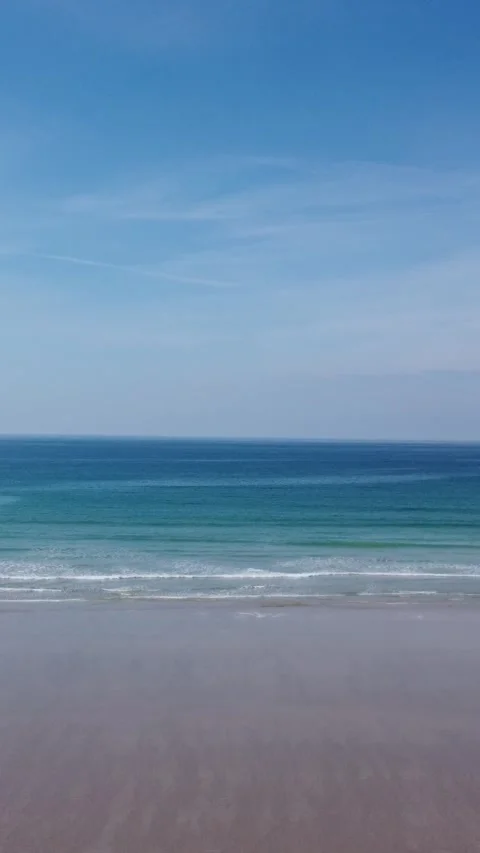 Vertical beach to ocean horizon drone shot Brittany France 库存影片 334035338