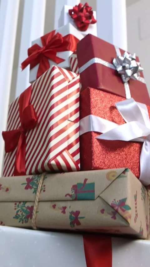 Vertical Beautiful gift boxes under a modern Christmas tree in home, Happy Xmas Stock Footage 313075818