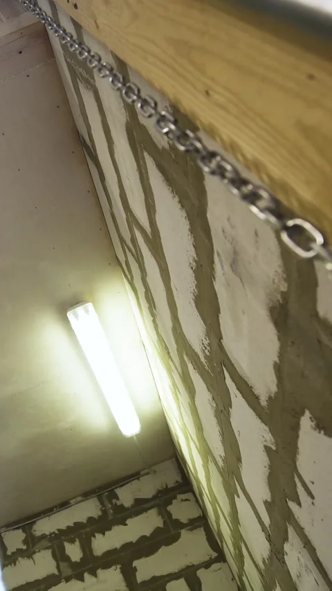 Vertical of Big garage chain hanging Stock Footage 305515859