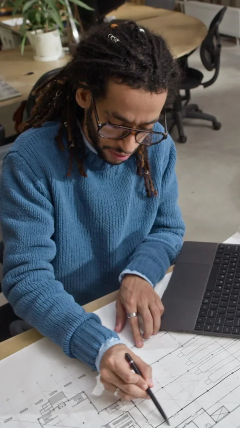 Vertical of Biracial Male Architect Drafting Floor Plan with Pencil and Ruler Stock Footage 327845651