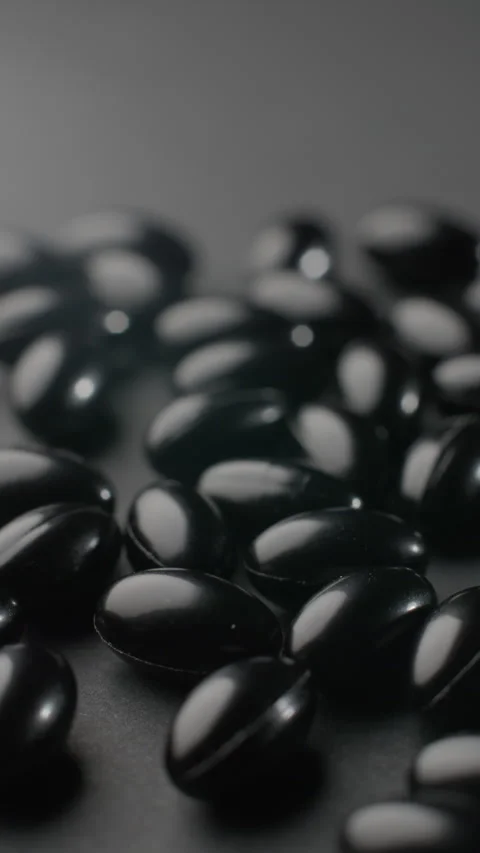 Vertical Black Astaxanthin Macro with Negative Space Video stock 332369733