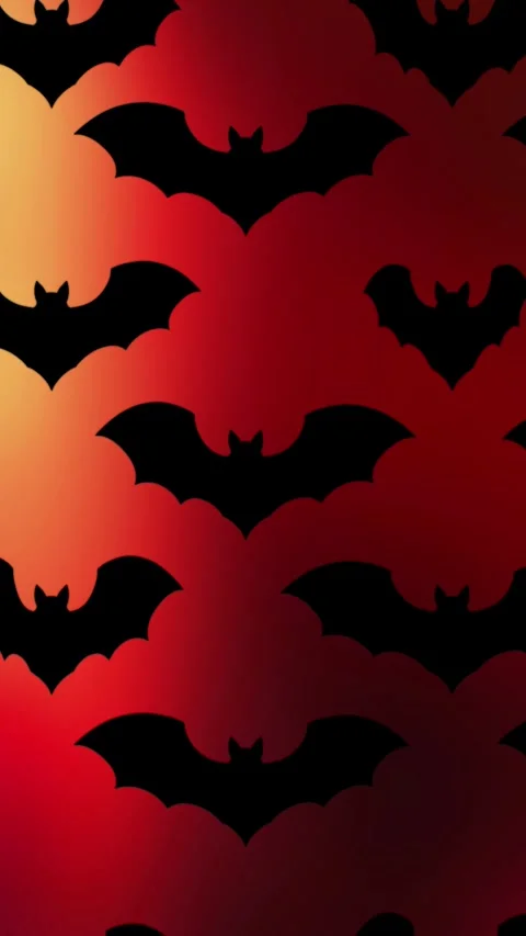 Vertical Black Bats Flying on Orange 4K Loop Stockbeeldmateriaal 341165080